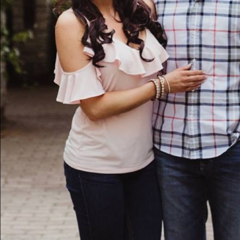 Express light pink off the shoulder frill blouse